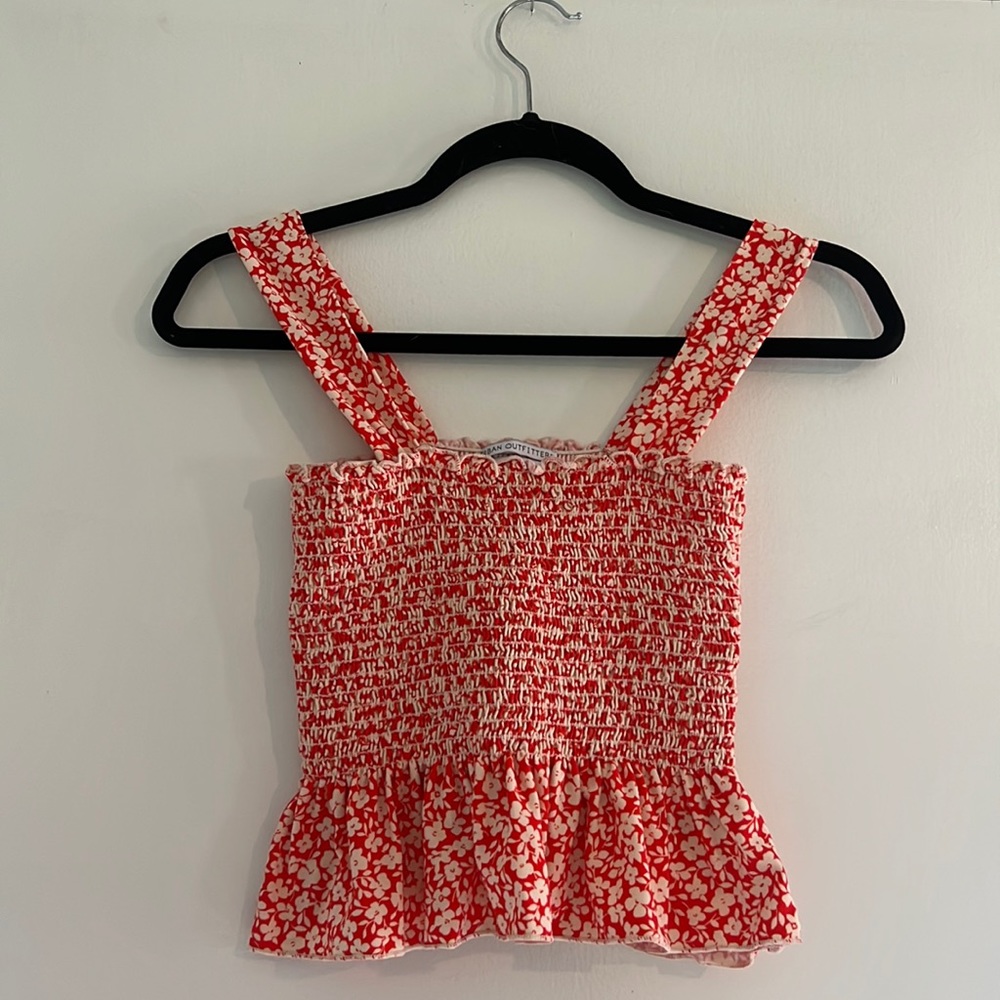 S, Urban Outfitters, Orange and cream floral tank top, like new, never worn.
